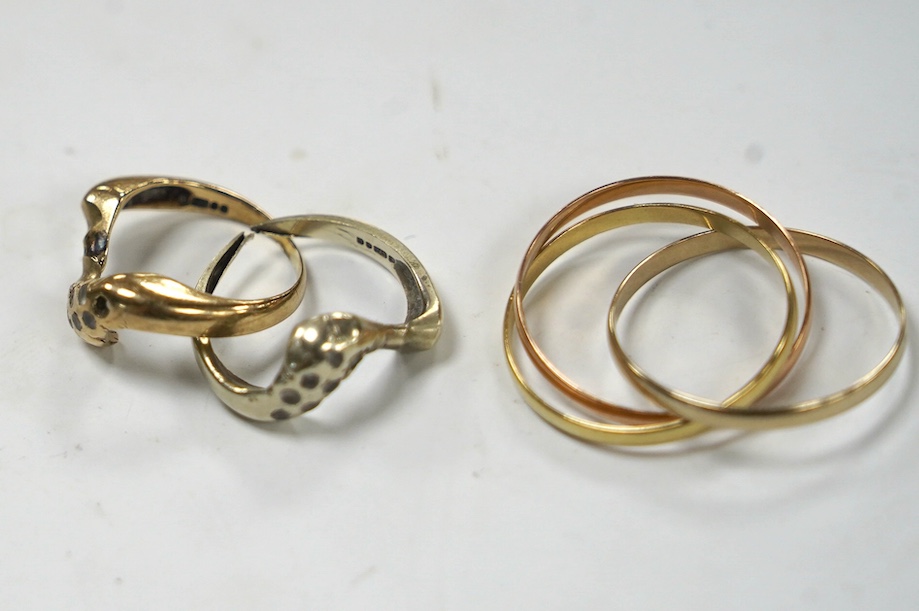 An Italian three colour 750 yellow metal 'Russian' wedding ring, size U/V, 3.6 grams, together with a two colour 9ct gold and gem set two band ring, gross weight 4.4 grams. Condition - poor to fair